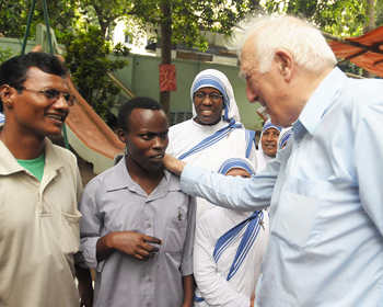 Jean Vanier Welcoming African Person sm