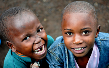 Two boys laughing.